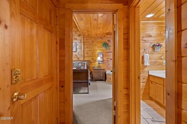 Downstairs hallway to bathroom and bedroom