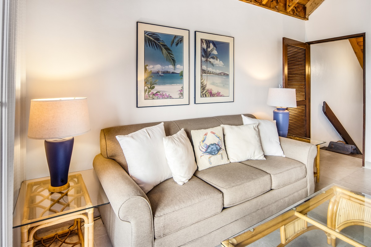 Cozy seating area in the primary suite&mdash;perfect for relaxing in your own private retreat.