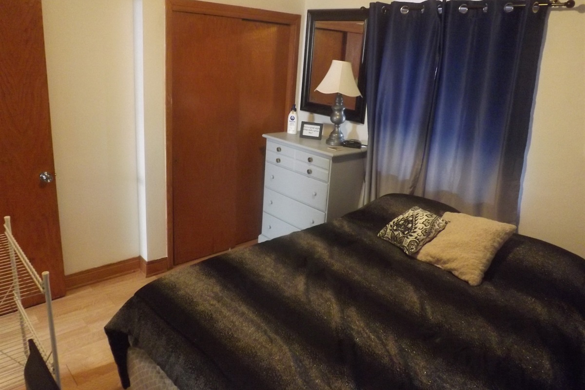 Queen bed with Roku smart TV