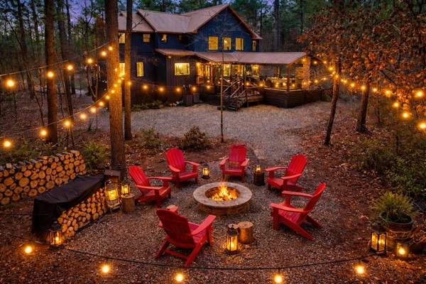 Cozy firepit nights under the string lights — guest favorite!