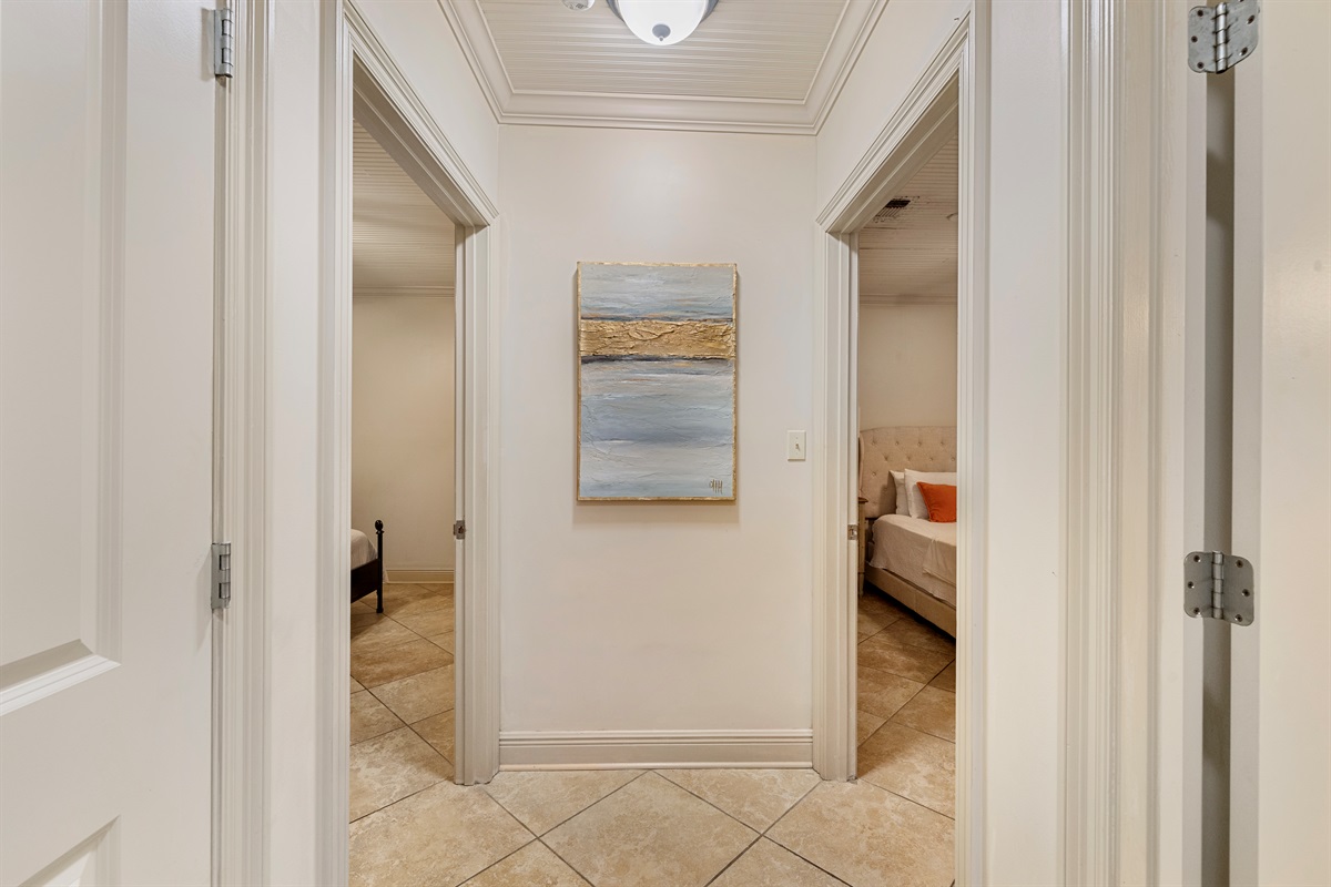 Artfully designed passage leading to vibrant bedrooms awaits your adventure