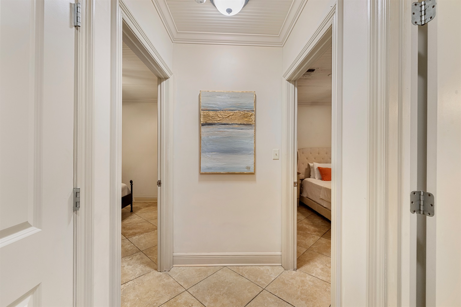 Artfully designed passage leading to vibrant bedrooms awaits your adventure