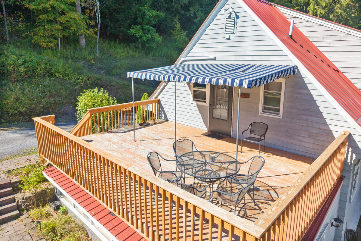 The Perch - View overlooking patio and Otsego Lake