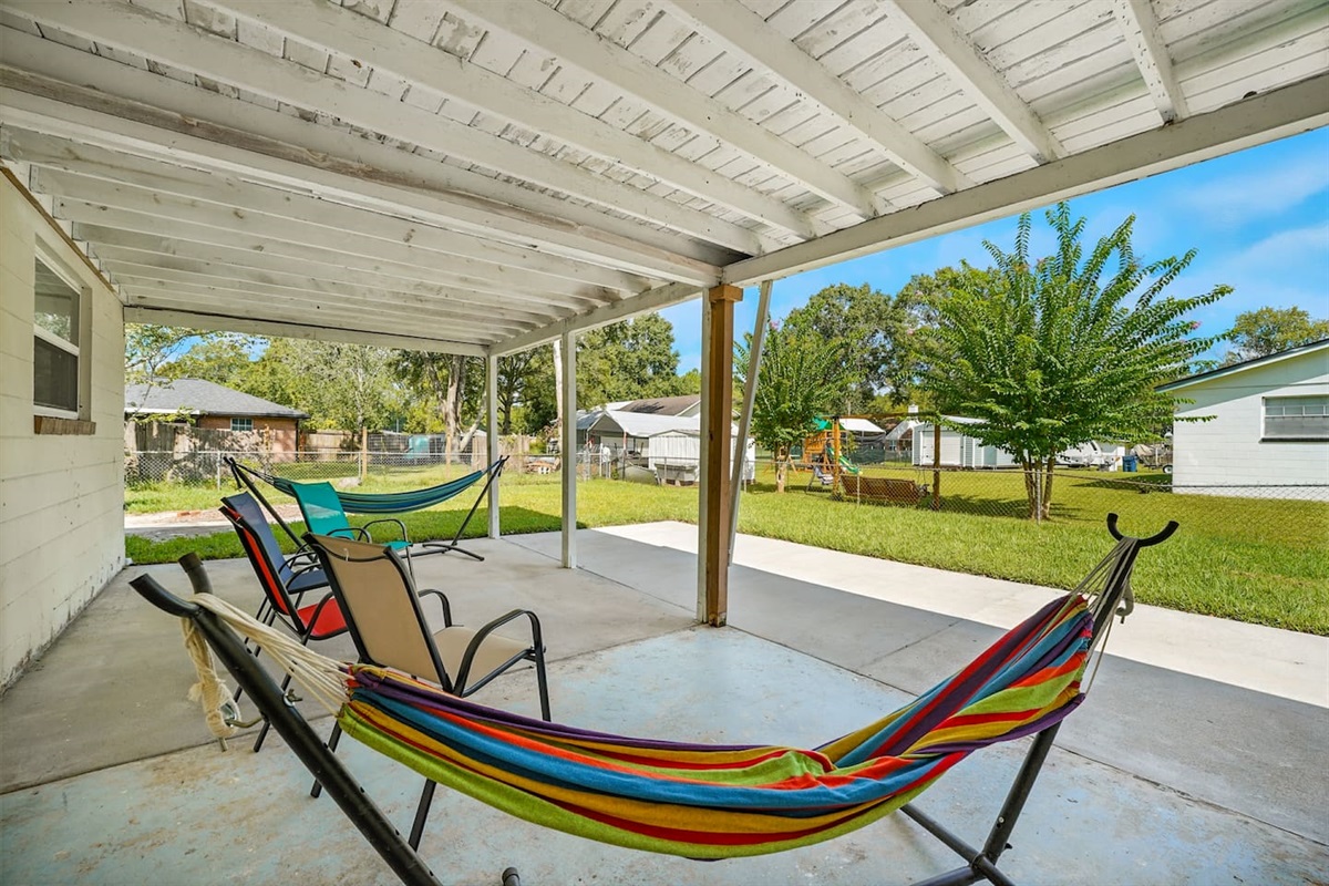 Back patio with hammocks and seating for 4