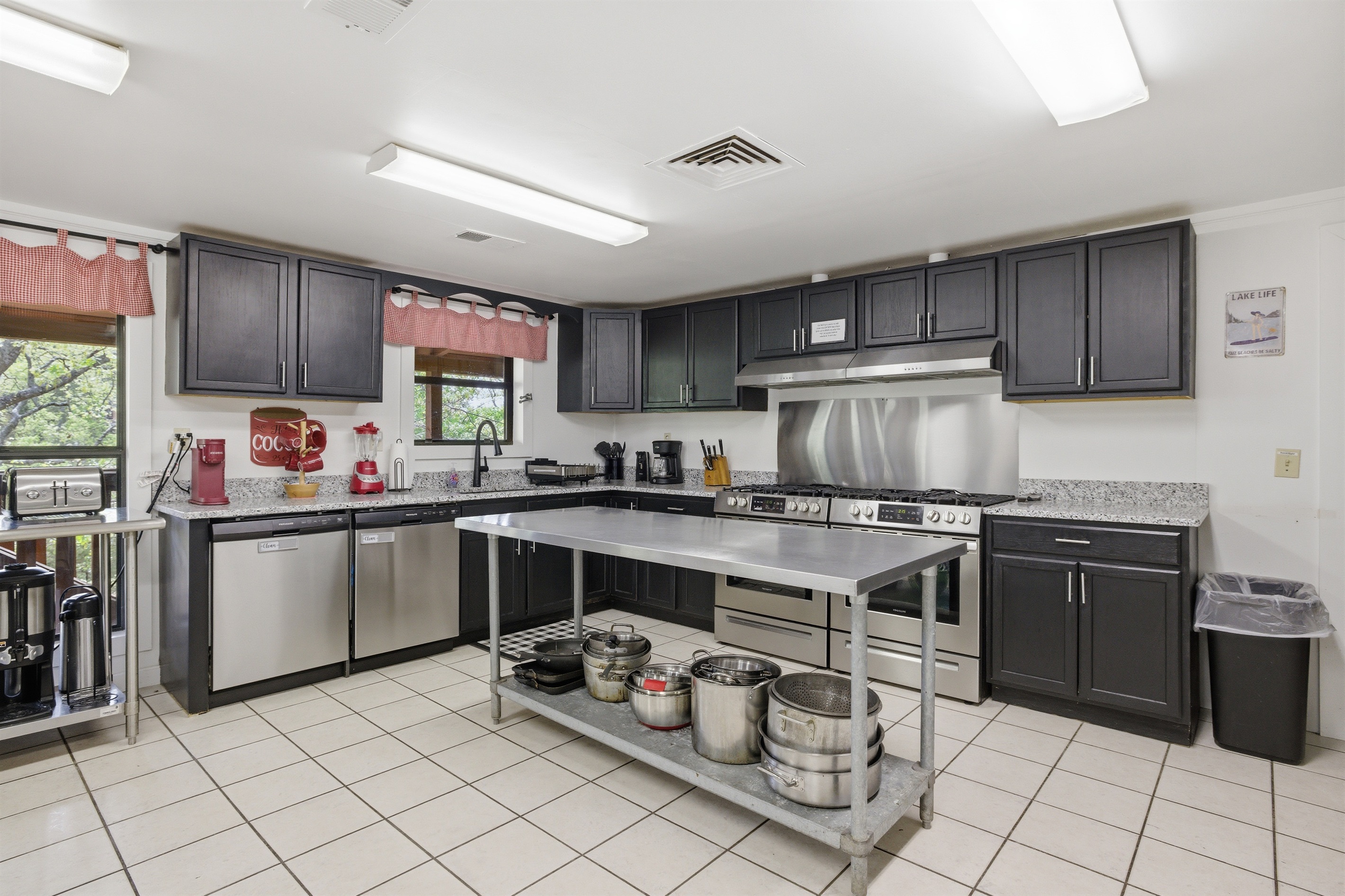 2 dishwashers and 2 gas stoves- lots of prep space
