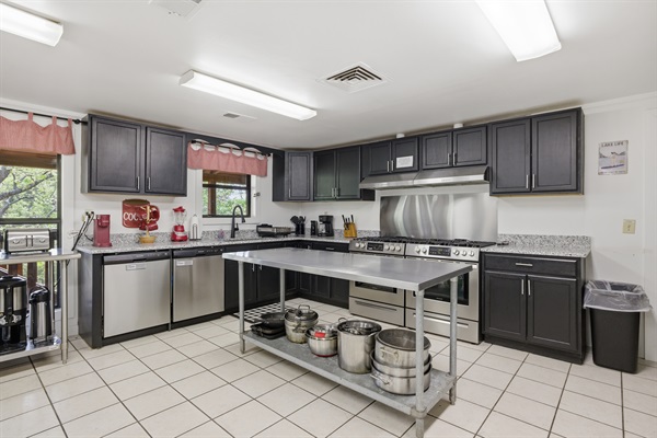 2 dishwashers and 2 gas stoves- lots of prep space