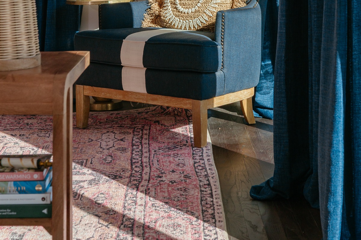 Adjacent to the bar and dining area is the living room, where you can unwind on our comfortable seating.