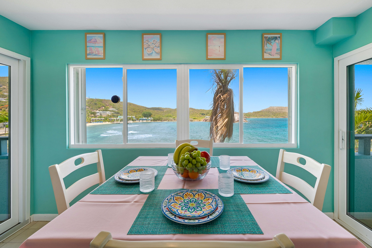 Enjoy your meals with breathtaking views of the Caribbean.