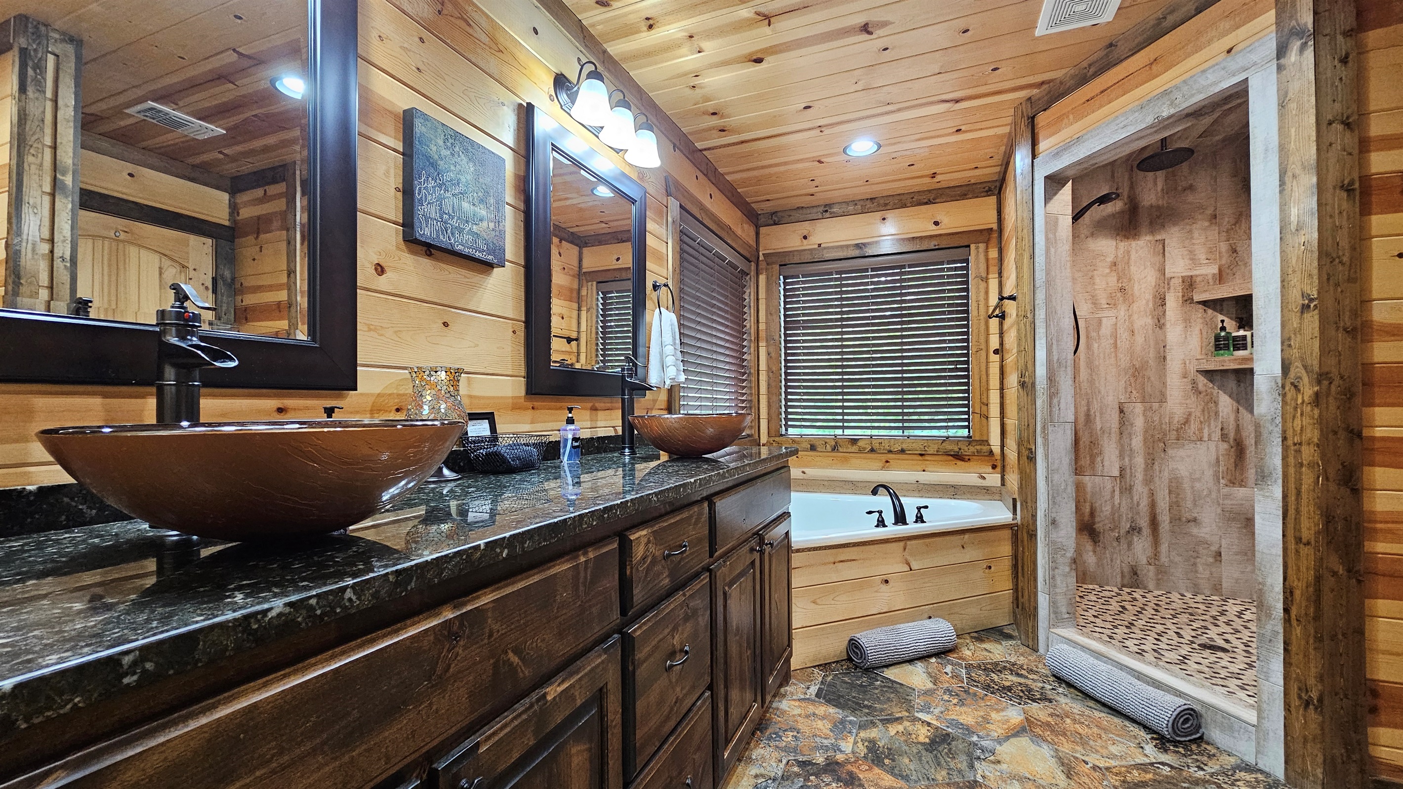 Luxury Bathroom: Unwind in style with a soaking tub and sleek rain shower surrounded by nature!