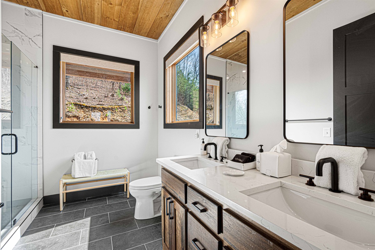 Spacious double vanity with abundant natural light