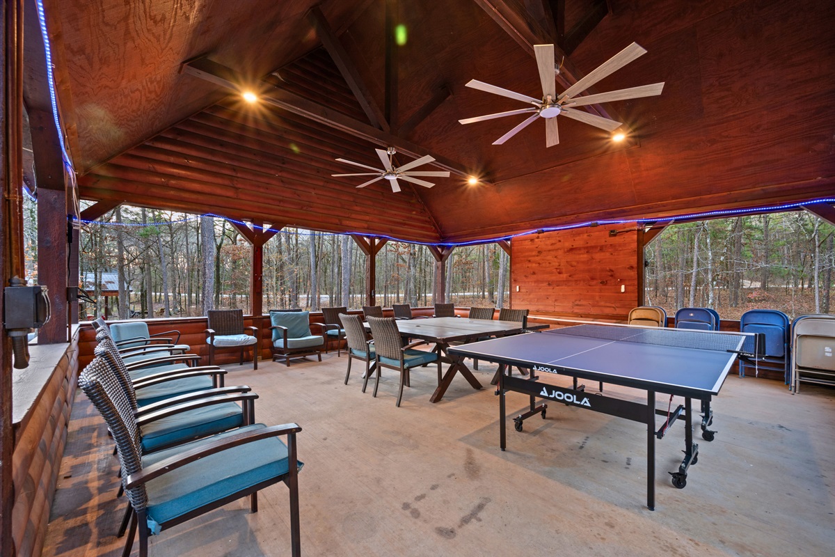 Covered and spacious, the pavilion creates an inviting place to gather for games, meals, or casual conversation throughout the day.
