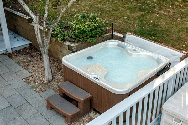 Our house features the perfect combo—an inviting pool and a relaxing hot tub!