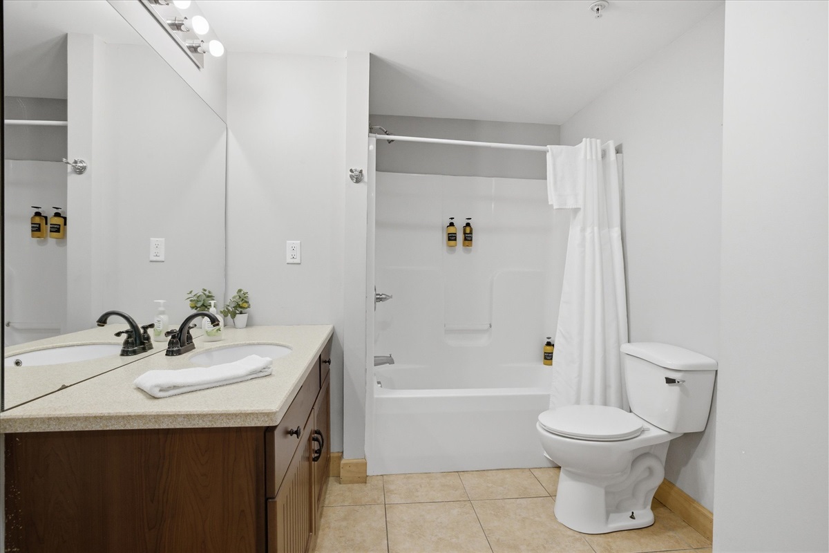Step into this king suite bathroom, where a clean, modern design and spacious layout give you room to get ready or wind down with ease after a full day.