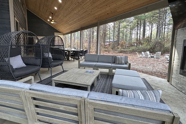 Back porch has plenty of seating.