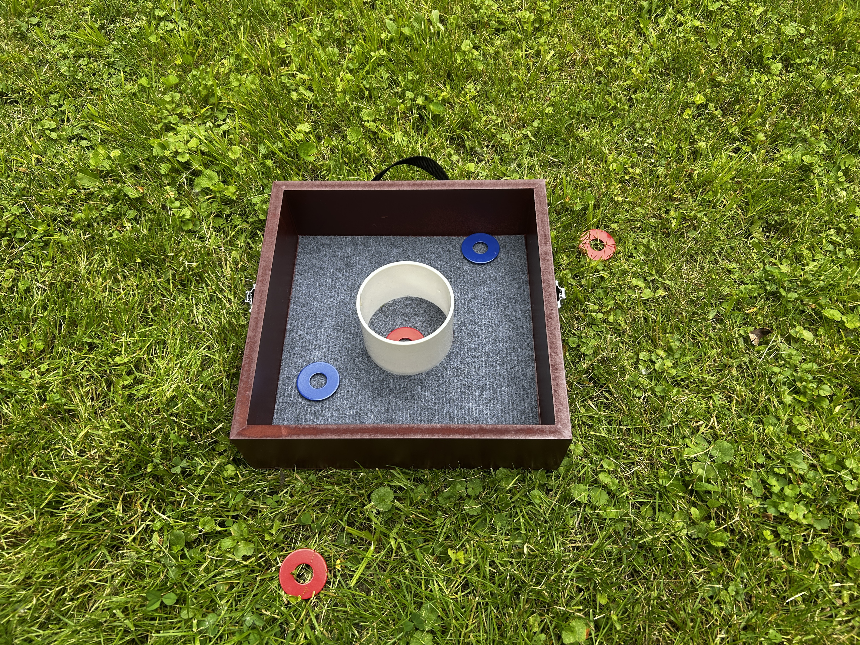 Get 2-4 people together to play a game of washer toss.
