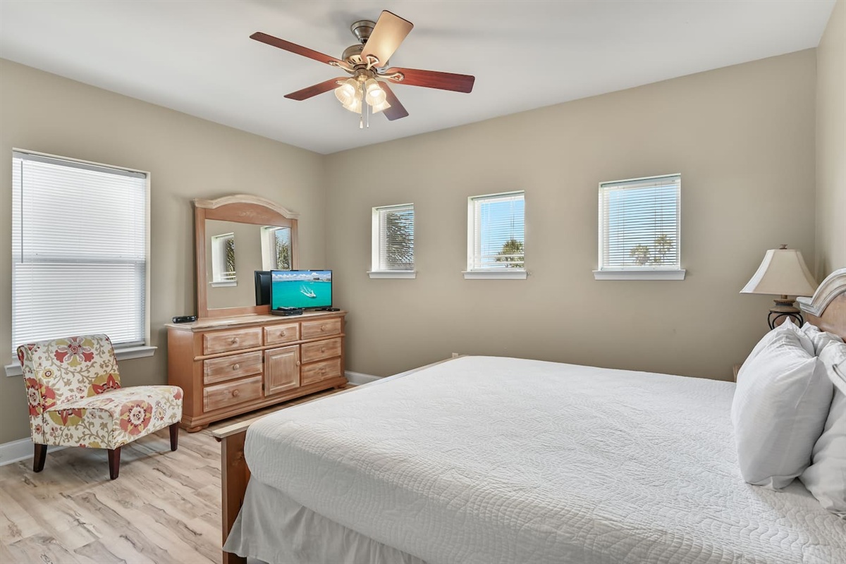 BEDROOM #2 + BATHROOM #2: King Bed with night stands, dresser, and TV. This bedroom has a private ba