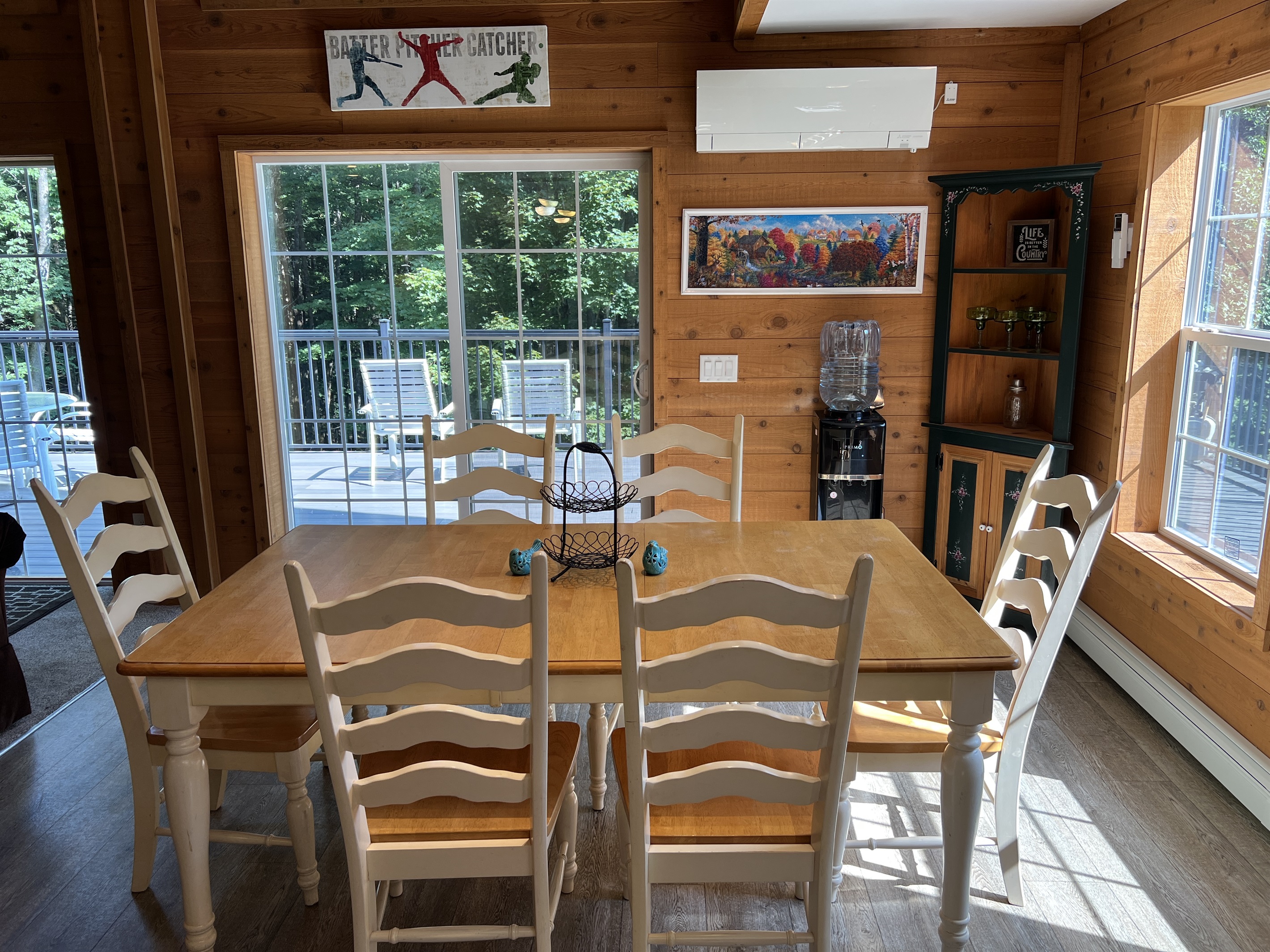 Dining area with sliders to deck beyond