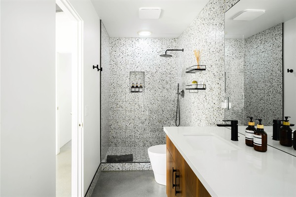 Double sink vanity in back primary bedroom