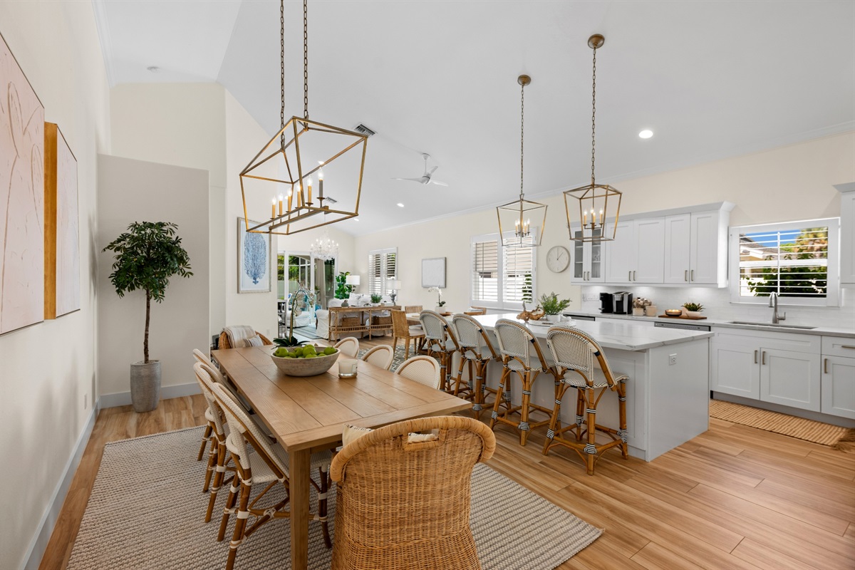 Fully Stocked Kitchen w/ Bar Seating and Two Tables!