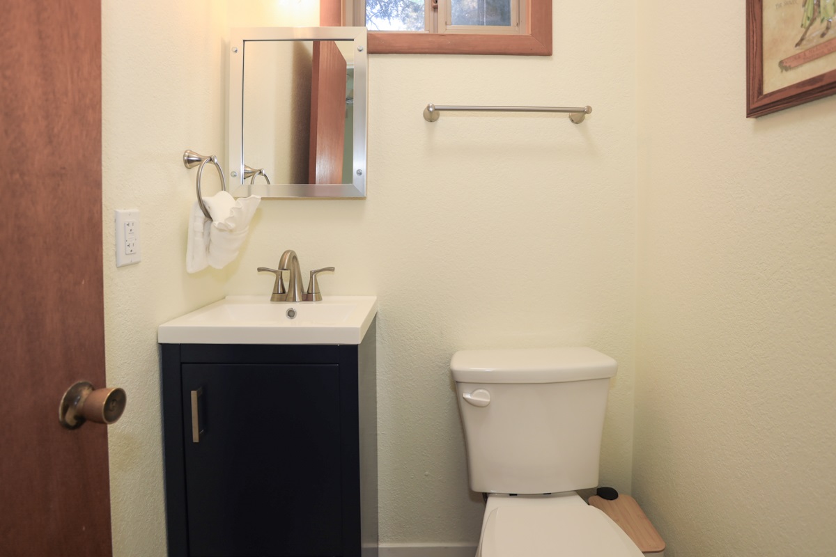 Powder Room - downstairs to the left. (Half bath)