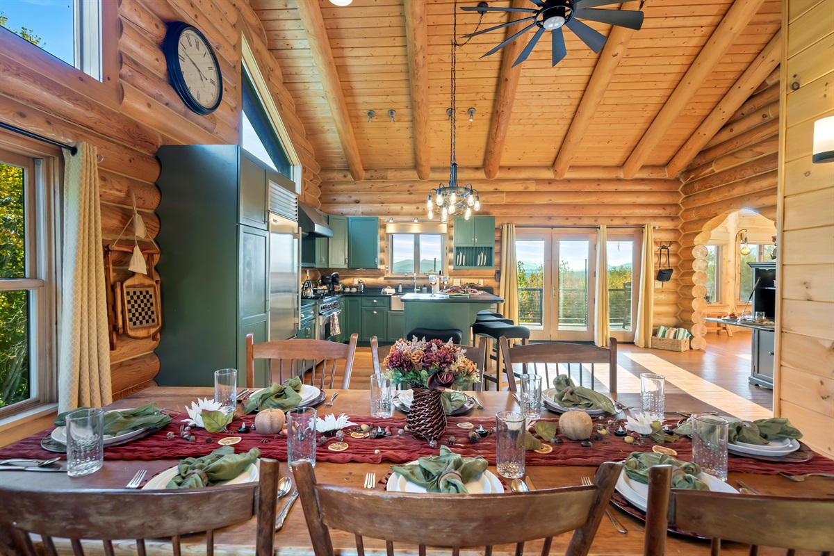 Bright, open kitchen with a bar and dining space.
