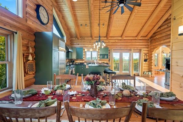 Bright, open kitchen with a bar and dining space.