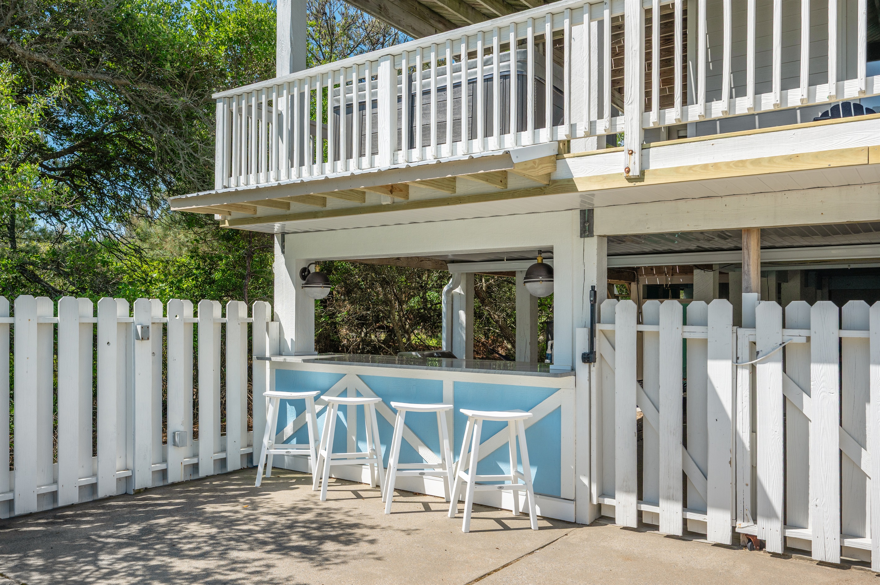 Fun poolside tiki bar area perfect for serving drinks, snacks, and enjoying sunny afternoons.
