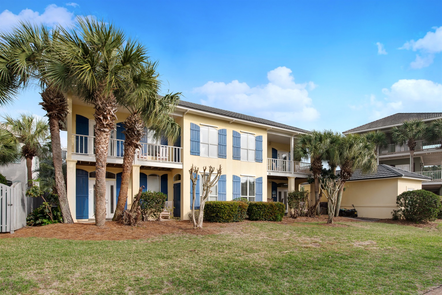 Bimini Breeze exterior with lush landscaping and coastal charm