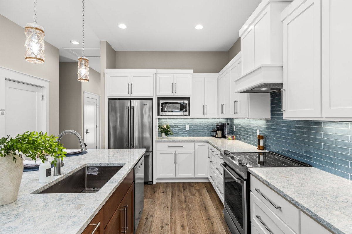Whether you're preparing fresh local seafood or a family breakfast before the beach, this fully equipped kitchen is ready for every meal.