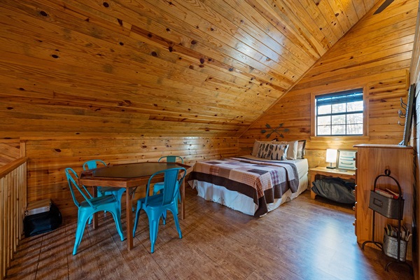 Poker table and bed in loft