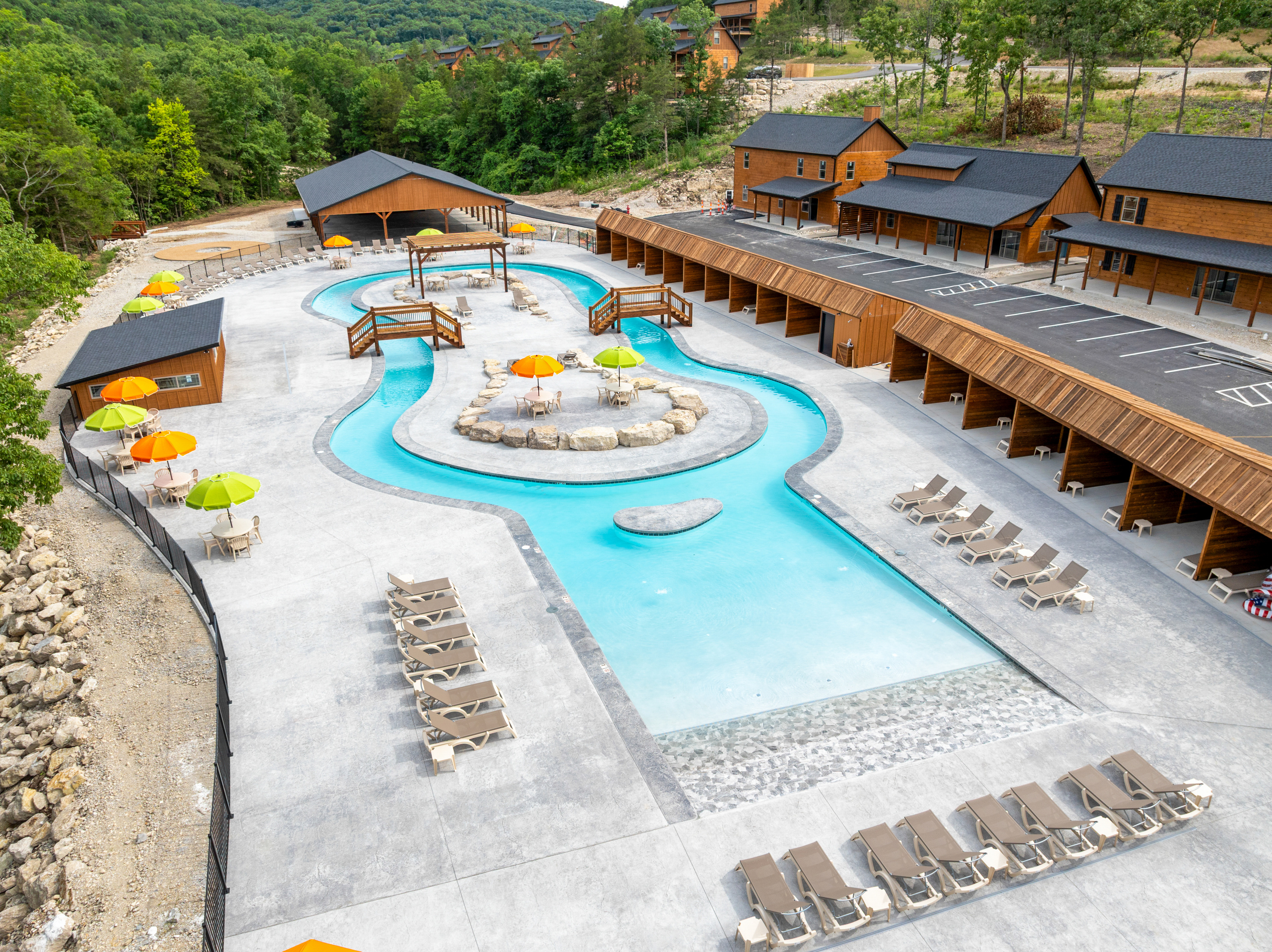 Float the brand-new lazy river and outdoor pool, the sparkling centerpiece of Tall Timbers Camp near Branson.