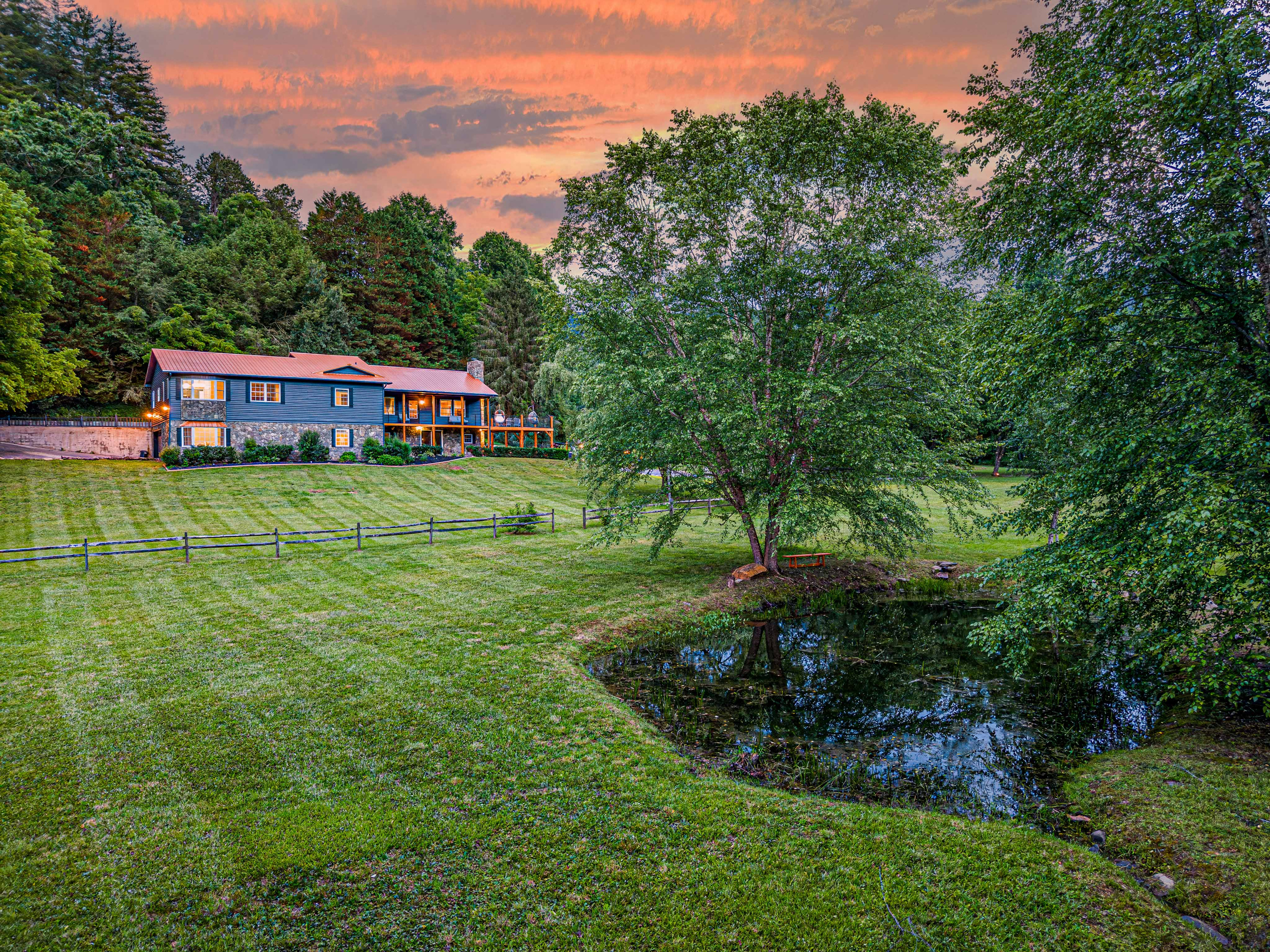 Embrace mountain charm with stunning views and lush greenery from your perfect retreat!