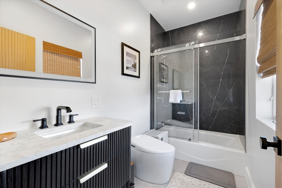 This bathroom has a tub for kids baths if needed. 