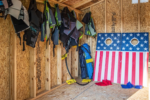 Our lakeside shed is complete with everything you need for outdoor fun - 4 kayaks, life vests, lake mat, floats, extra chairs, spike ball, corn hole, hammocks, and dry firewood.