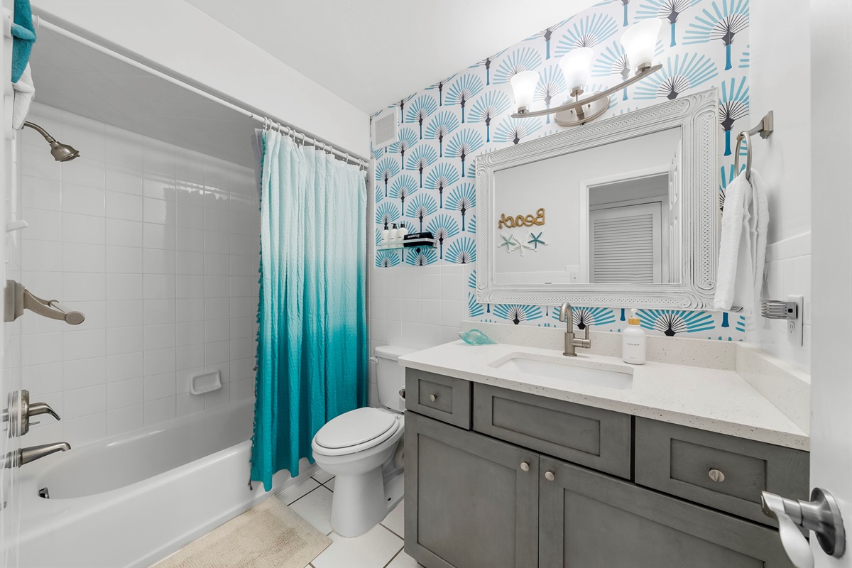 Guest Bathroom with all the essentials so you can simply walk to the beach or the pool and not have to worry about bringing the basics!