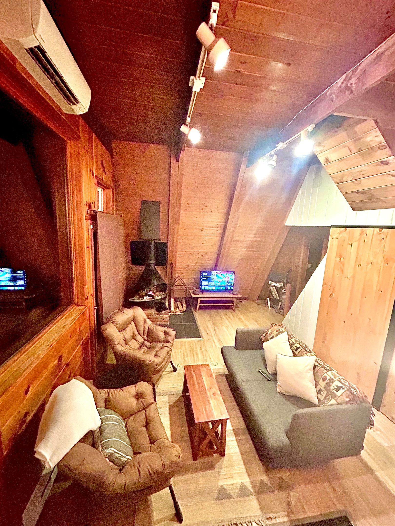 Living Room space with TV and fireplace.