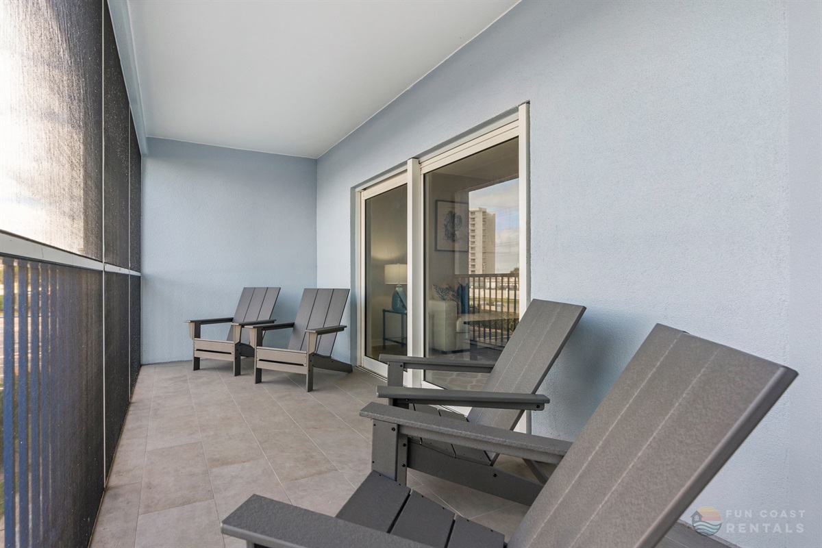 East-Facing Balcony View with Screen and Ample Seating