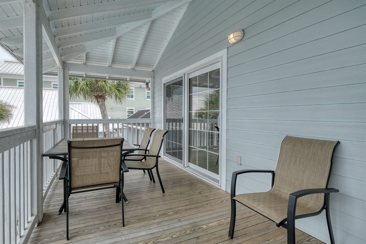 Porch has out door dining