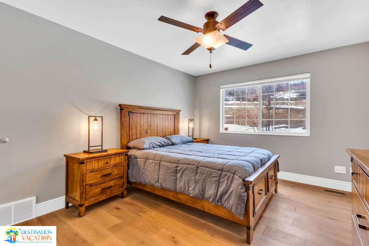 Comfortable bedroom retreat surrounded by peaceful mountain scenery.