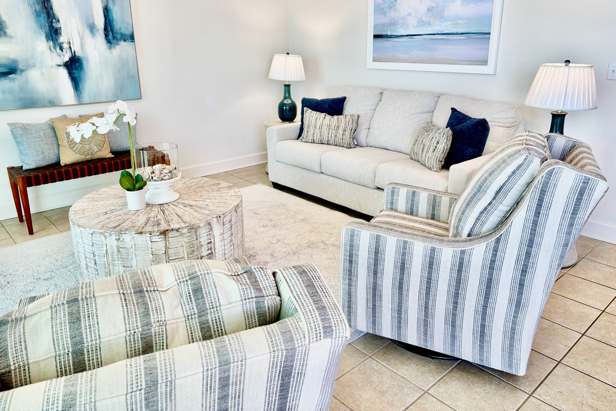 Brand new living room chairs, queen sofa sleeper and all accent furniture and art is new too!