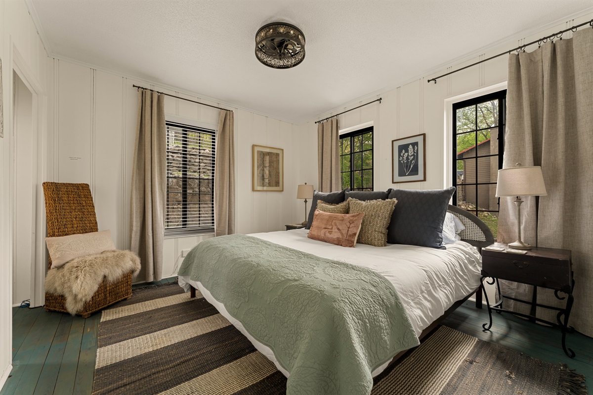 Rest easy in a serene, thoughtfully styled bedroom.