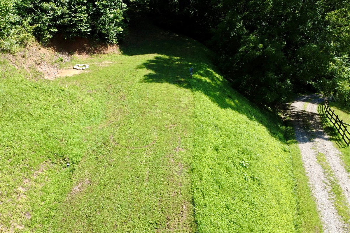 Site 4 nestled in the mountains with pasture views.
