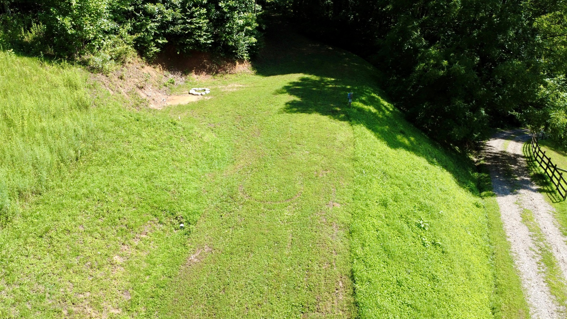 Site 4 nestled in the mountains with pasture views.
