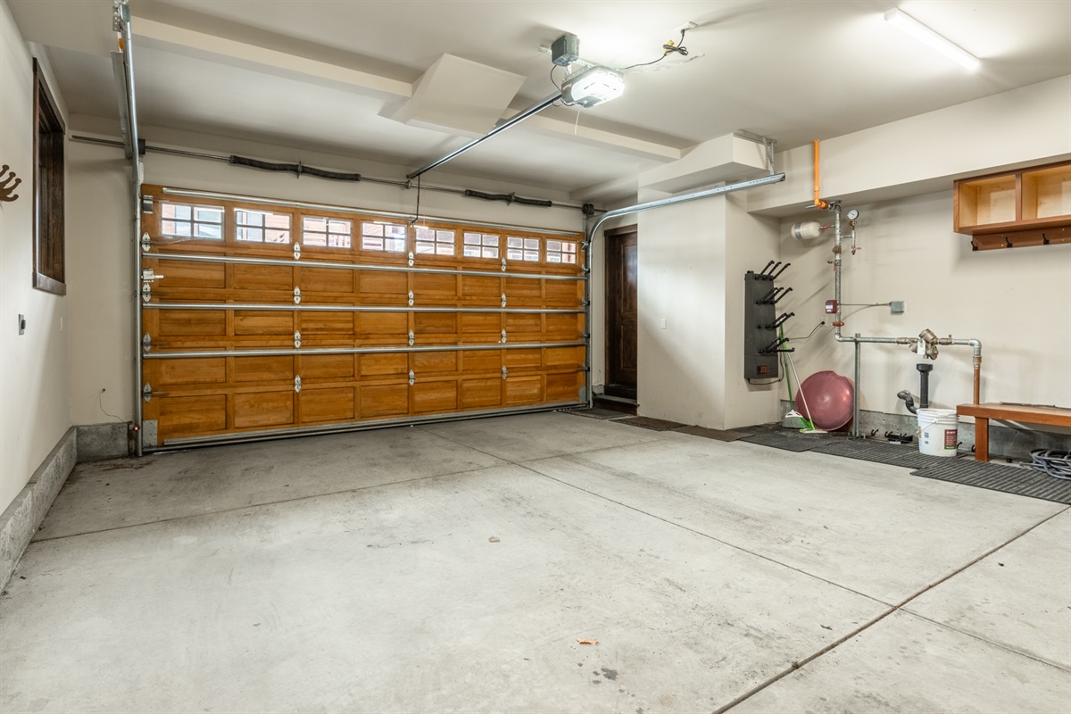 The oversized private garage offers ample space for vehicles and gear — a rare convenience in Mammoth.