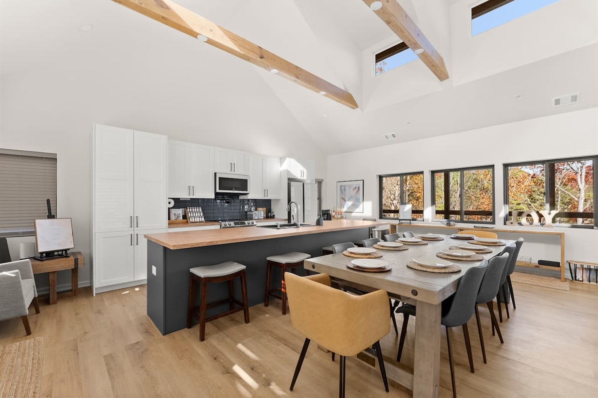 Spacious dining table with extensions available to host up to 14 guests