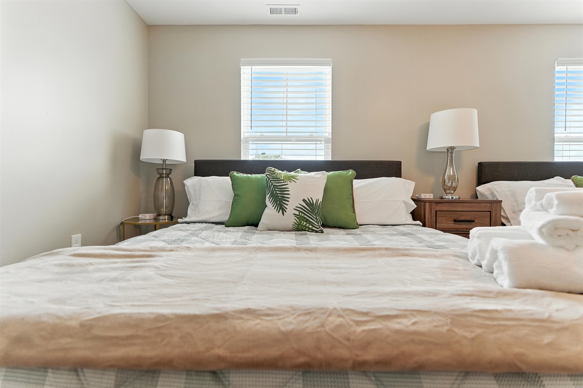 Well-appointed bedroom with nightstands