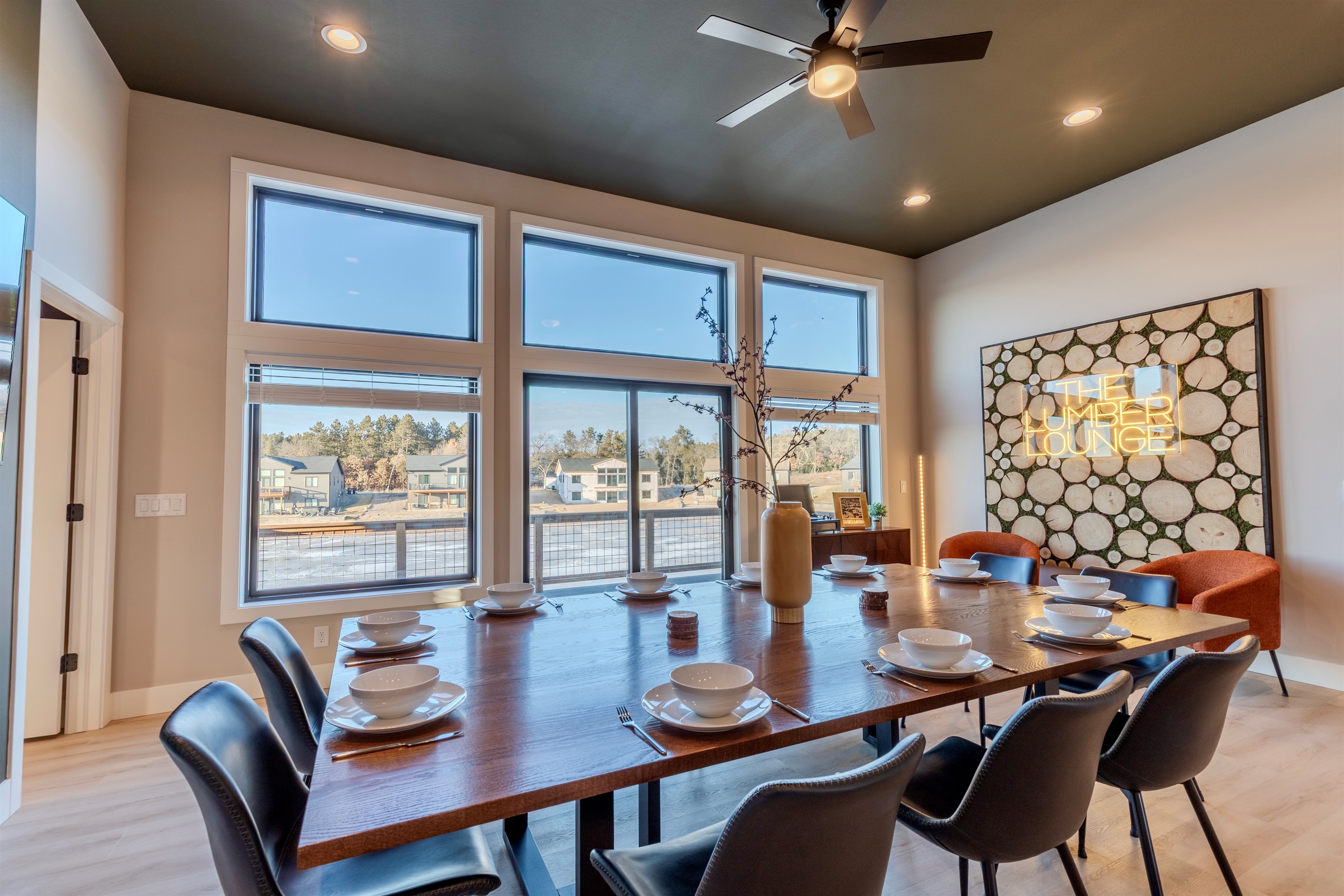 Our dining area & kitchen island will seat up to 16 guests.