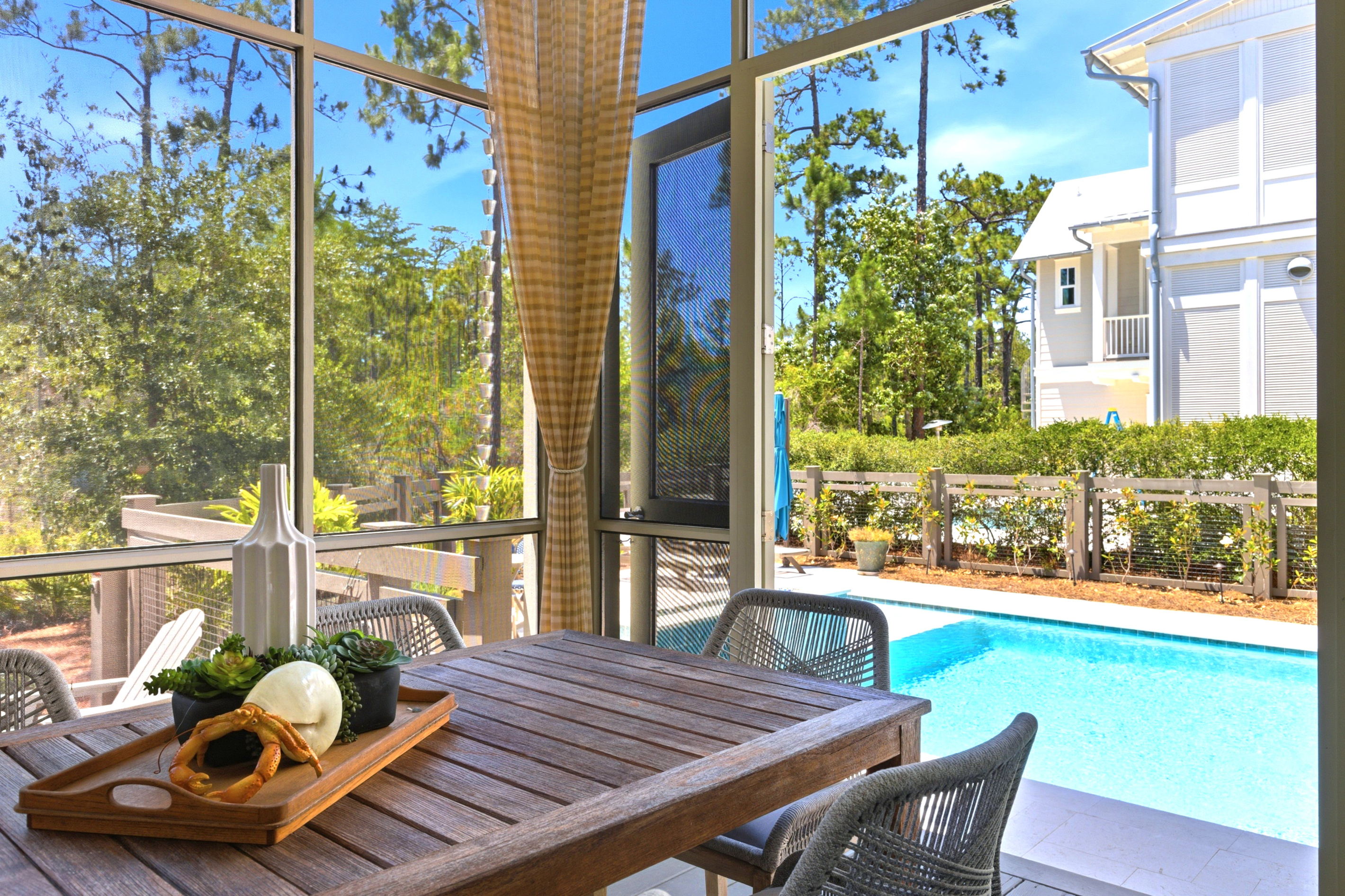 Outdoor Dining Besides the Pool for Memorable Family Meals