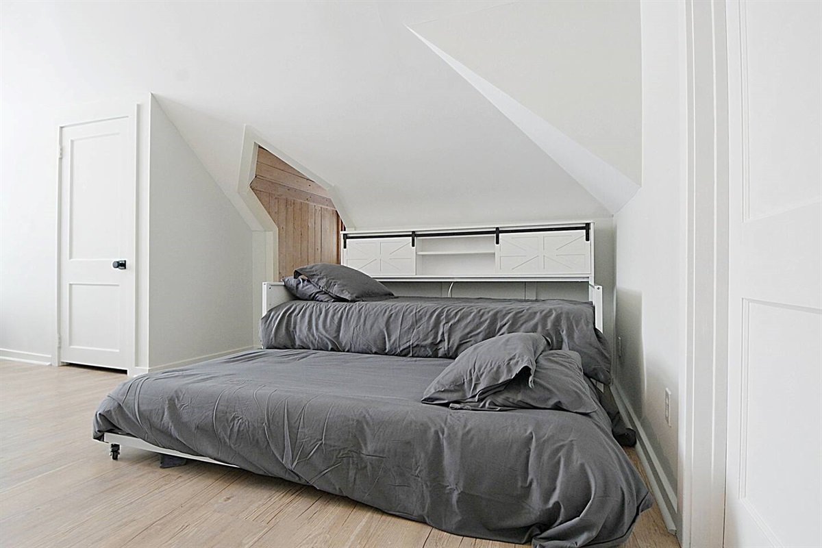 The 2nd fl bedroom has a twin bed + trundle for the little ones :)