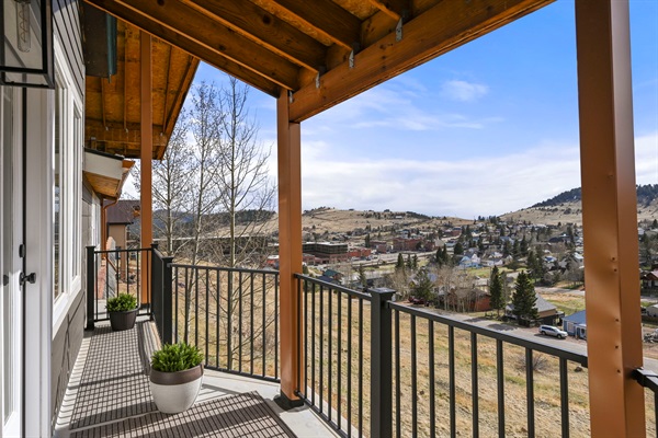 Enjoy the view from the private walk out deck off of Bedroom 4